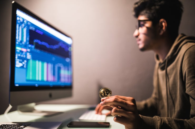 Indian Bitcoin Trader Checking Stock Trading Data Analysis Concept Working Office With Financial Graph Computer Monitors 231208 3645