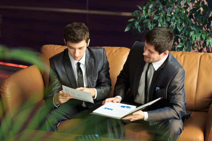 Two Young Businessmen Discussing Project 160672 13307